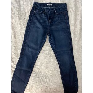 Size 29 - High Rise, skinny, stretch jeans.